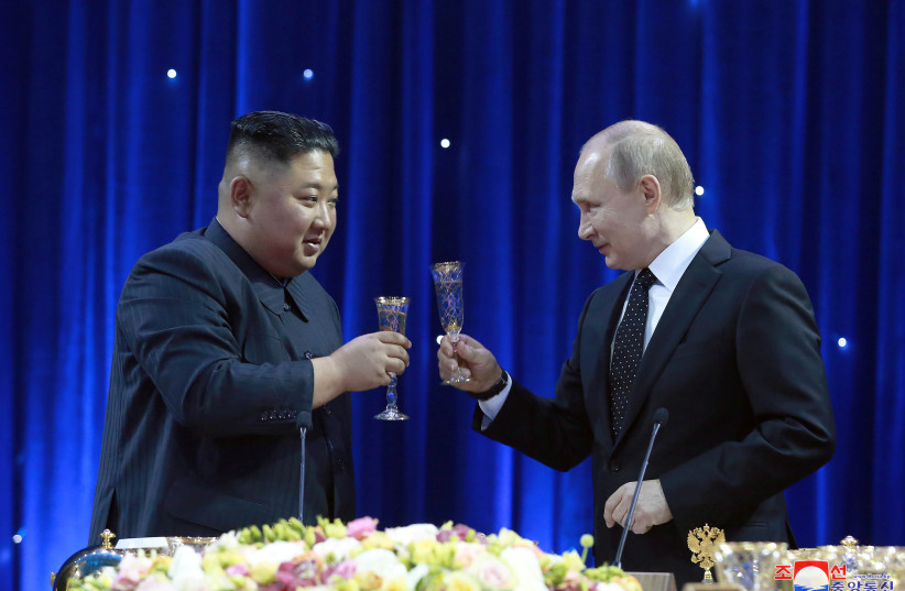  North Korean leader Kim Jong Un and Russian President Vladimir Putin attend an official reception following their talks in Vladivostok, Russia in this undated photo released on April 25, 2019. (photo credit: KOREAN CENTRAL NEWS AGENCY KCNA VIA REUTERS)