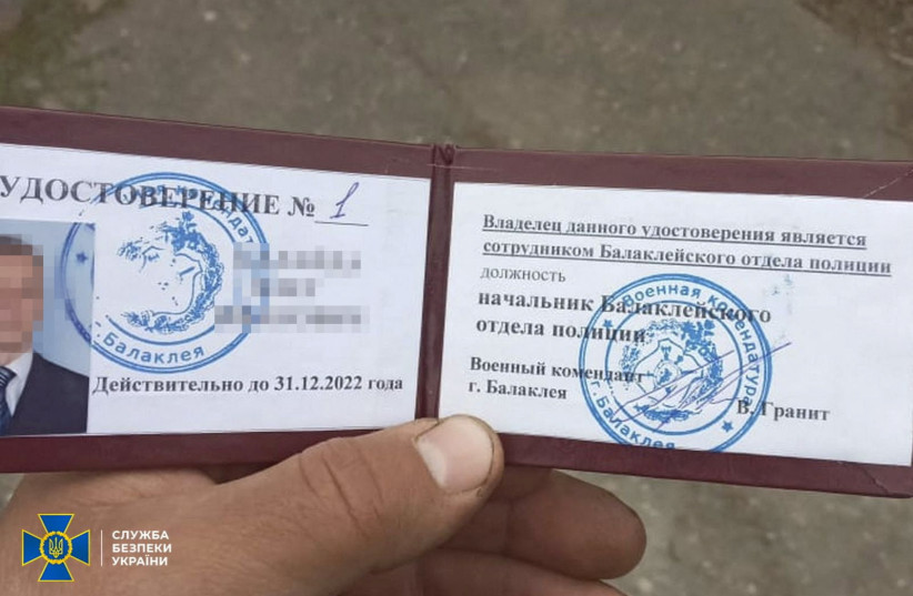  An undated handout image shows an ID document issued to a local police officer in Balakliia, eastern Ukraine, by the self-proclaimed Russian authorities, signed by military commandant Granit.  (photo credit: State Security Service of Ukraine/Handout via REUTERS)