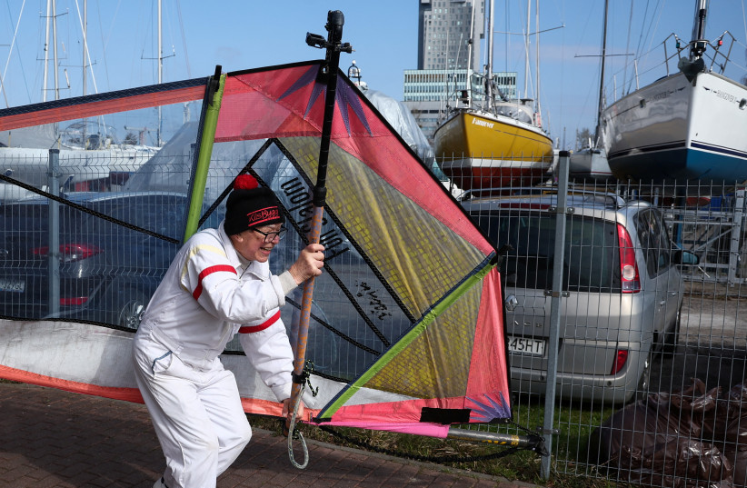  Polish retiree Piotr Dudek is hoping to officially become the world's oldest windsurfer (credit: REUTERS)