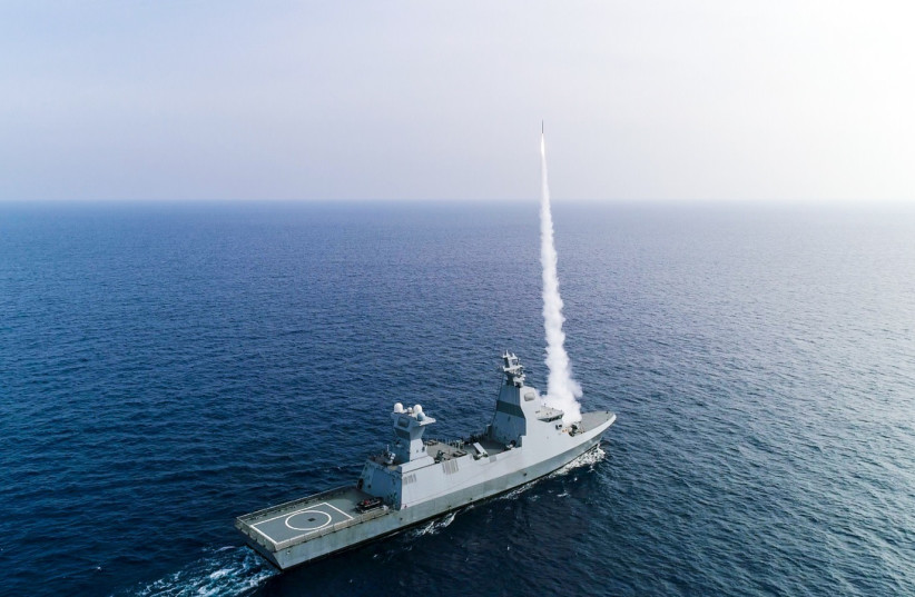  An Israeli Navy vessel is seen firing a missile (credit: IDF SPOKESPERSON'S UNIT)