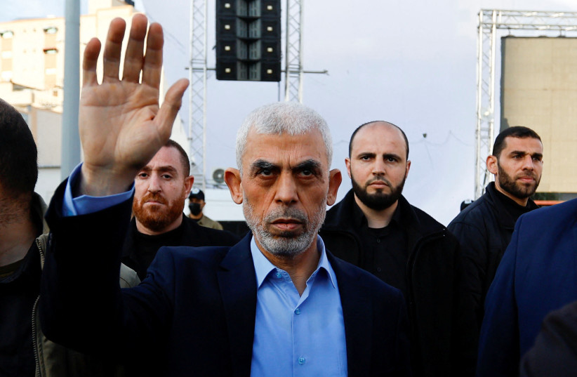  Yahya Sinwar Gaza Strip chief of the Palestinian Islamist Hamas movement, waves to Palestinians during a rally to mark the annual al-Quds Day (Jerusalem Day), in Gaza, April 14, 2023. (credit: REUTERS/IBRAHEEM ABU MUSTAFA)