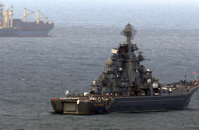  A Russian nuclear-powered cruiser Pyotr Veliky or ''Peter the Great'' arrives at the port of La Guaira outside Caracas November 25, 2008. A fleet of Russian warships arrived in Venezuela on Tuesday to conduct joint naval exercises off the Caribbean nation. The exercises, which are being closely watch (credit: JORGE SILVA / REUTERS)
