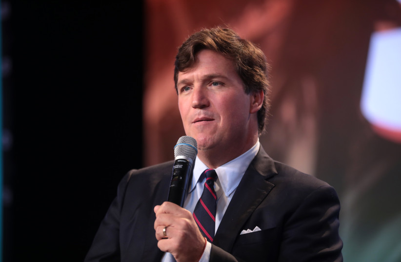  Tucker Carlson speaking with attendees at the 2018 Student Action Summit hosted by Turning Point USA at the Palm Beach County Convention Center in West Palm Beach, Florida. (credit: GAGE SKIDMORE/WIKIMEDIA COMMONS)