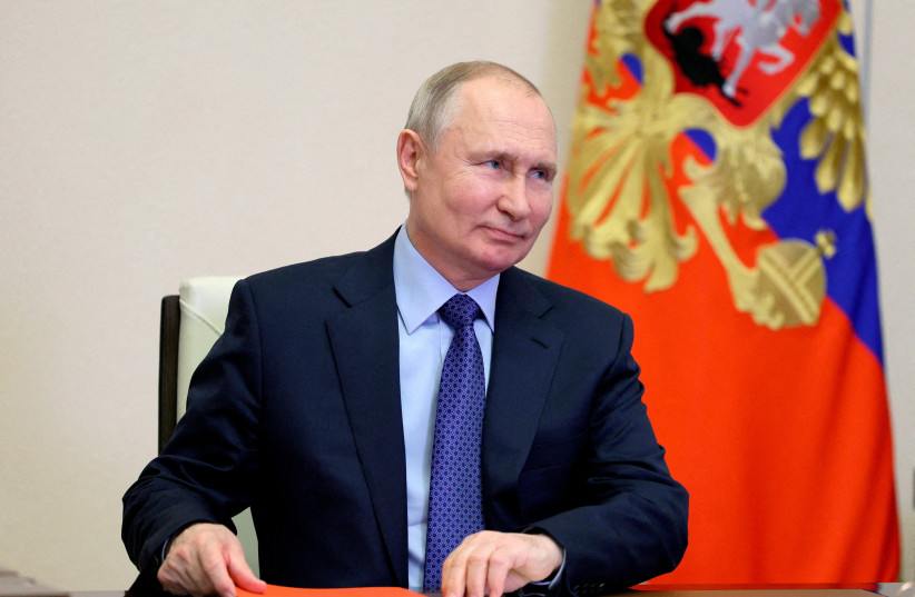  Russian President Vladimir Putin chairs a meeting with members of the Security Council via a video link at the Novo-Ogaryovo state residence outside Moscow, Russia, April 21, 2023. (photo credit: SPUTNIK/ALEXEI BABUSHKIN/KREMLIN VIA REUTERS)