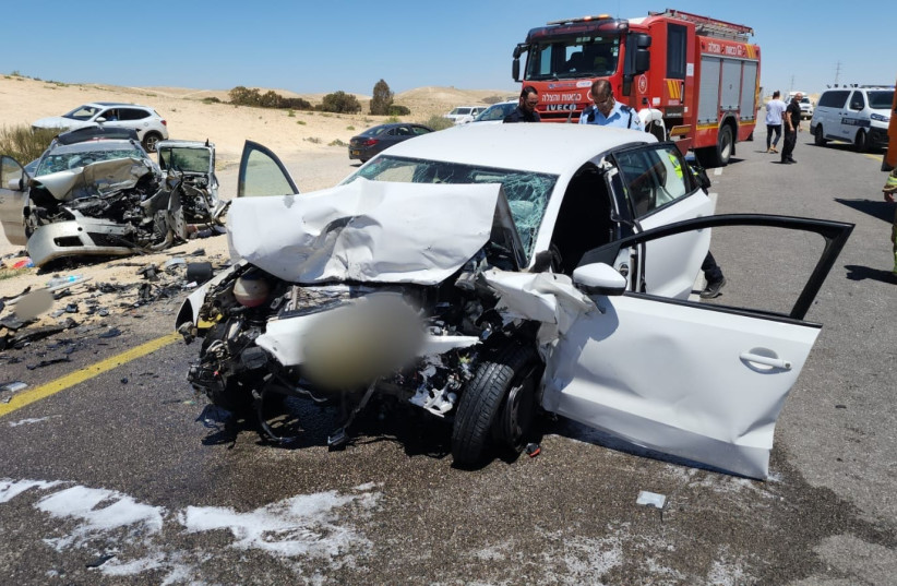  The scene of a serious car crash on Highway 40 in Israel's South that resulted in multiple casualties, on April 26, 2023. (photo credit: MAGEN DAVID ADOM)