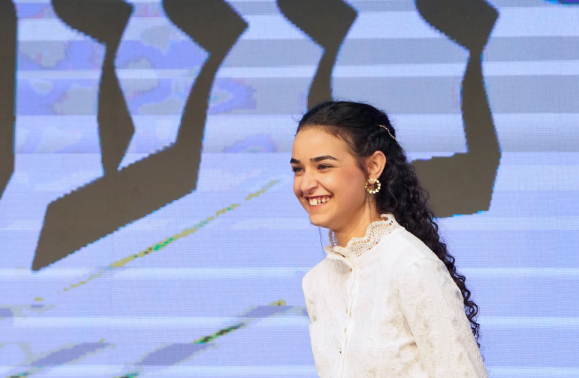  Emuna Cohen, winner of the Bible Quiz seen at the annual Bible Quiz held at the Jerusalem Theatre on Israel's Independence Day, on April 26, 2023. (photo credit: SHALEV SHALOM/POOL)