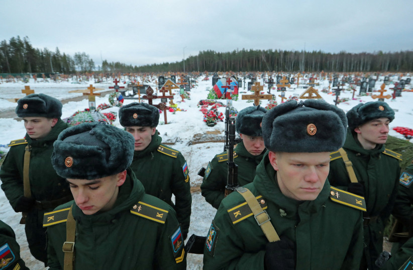  Cadets of a military academy attend the funeral of Dmitry Menshikov, a mercenary for the private Russian military company Wagner Group, killed during the military conflict in Ukraine, in the Alley of Heroes at a cemetery in Saint Petersburg, Russia December 24, 2022. (photo credit: REUTERS/IGOR RUSSAK)