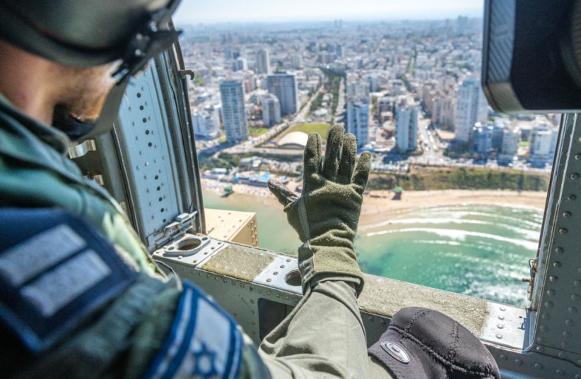  Israeli Air Force pilots look down at Tel Aviv during the annual Independence Day flyover, April 26, 2023. (credit: IDF SPOKESPERSON'S UNIT)