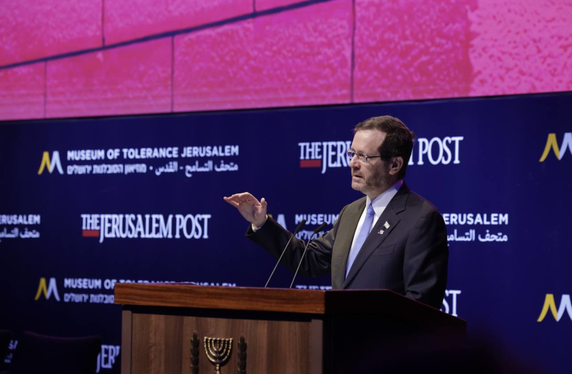  President Isaac Herzog speaks at the Celebrate the Faces of Israel conference. (credit: MARC ISRAEL SELLEM/THE JERUSALEM POST)
