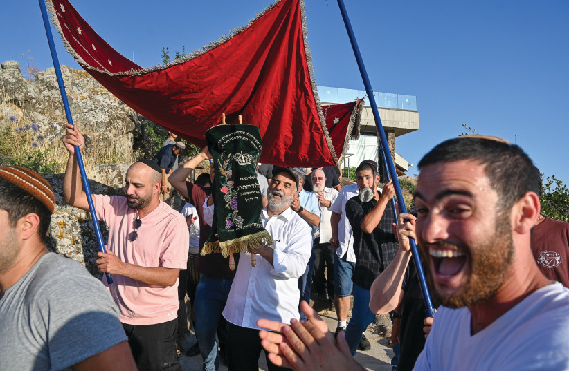  CELEBRATING A new Torah scroll: ‘No other nation has overturned the destiny of mankind as powerfully as the Jewish people.’  (credit: MICHAEL GILADI/FLASH90)