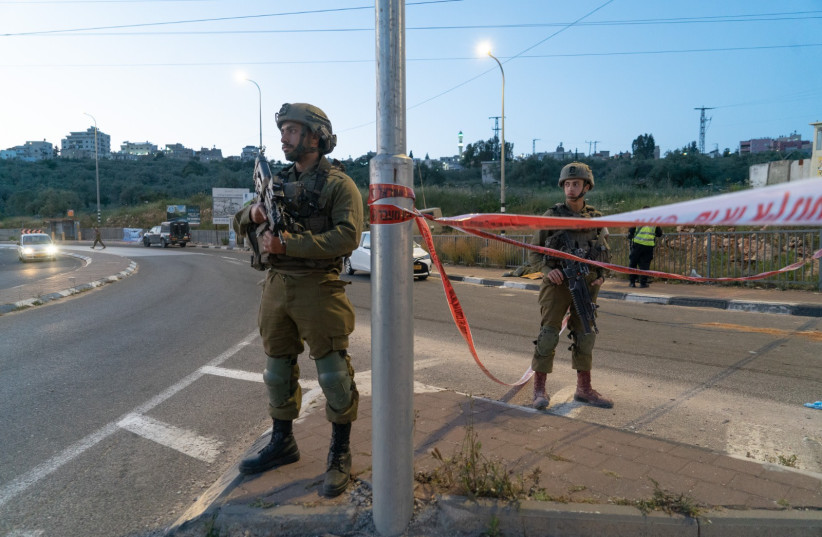  Soldiers at the scene of an attempted ramming and stabbing attack near Ariel, April 27, 2023. (photo credit: IDF SPOKESPERSON UNIT)