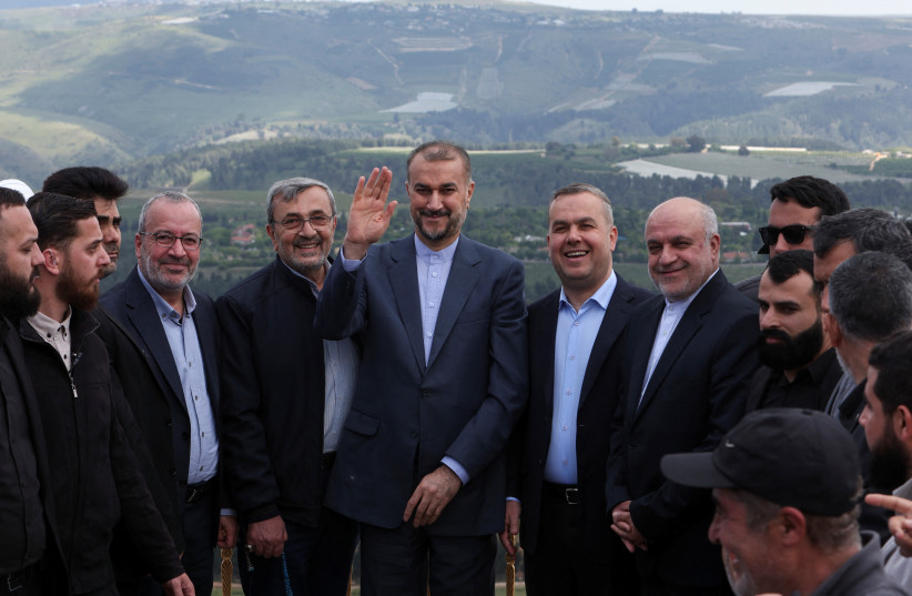  Iranian Foreign Minister Hossein Amirabdollahian gestures as he stands next to Hezbollah officials during his visit to Maroun Al-Ras village near the border between Lebanon and Israel, Lebanon April 28, 2023. (photo credit: REUTERS/AZIZ TAHER)