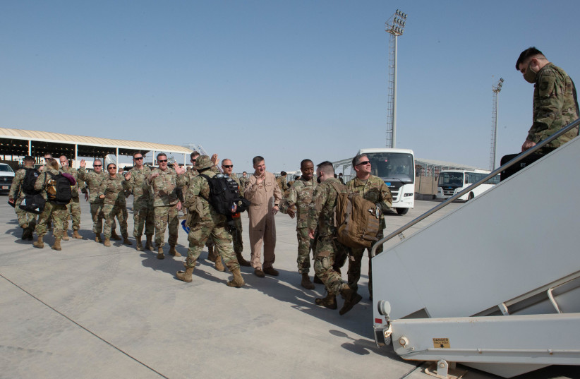  Airmen of the U.S. Air Force arrive at Al Dhafra Air Base, Abu Dhabi, United Arab Emirates, in this photo taken on February 12, 2022 and released by the U.S. Air Force on February 12, 2022. (credit: U.S. Air Force Central Command/Sgt. Chelsea E. FitzPatrick/Handout via REUTERS)