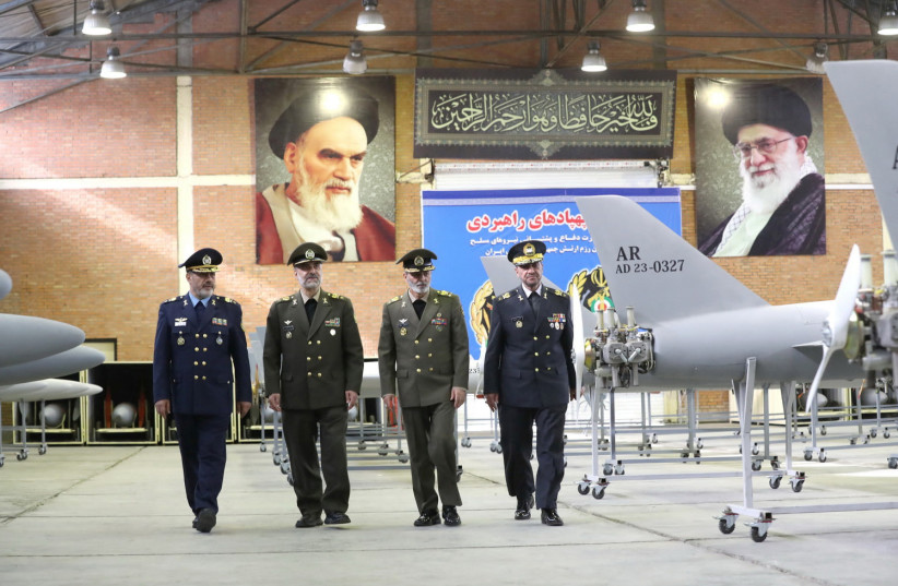  Iran's Army chief Major General Abdolrahim Mousavi and Defense Minister Brigadier General Mohammad-Reza Ashtiani visit a drone site at an undisclosed location in Iran, in this handout image obtained on April 20, 2023. (photo credit: IRANIAN ARMY/WANA/REUTERS)