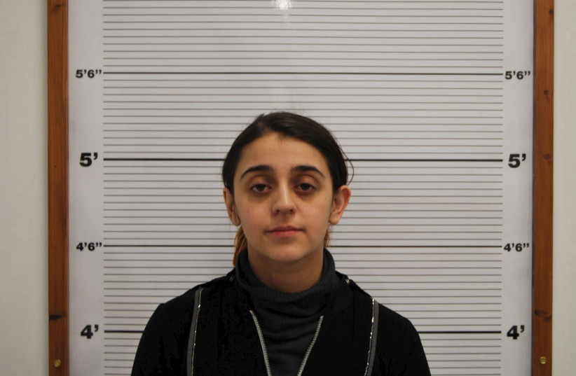 Tareena Shakil is seen after her arrest, in this undated booking picture courtesy of West Midlands Police. The British mother who took her 14-month-old son to Syria to join Islamic State fighters and allowed him to be photographed wearing a balaclava next to an assault rifle, was jailed for six year (photo credit: REUTERS/West Midlands Police/Handout via Reuters )
