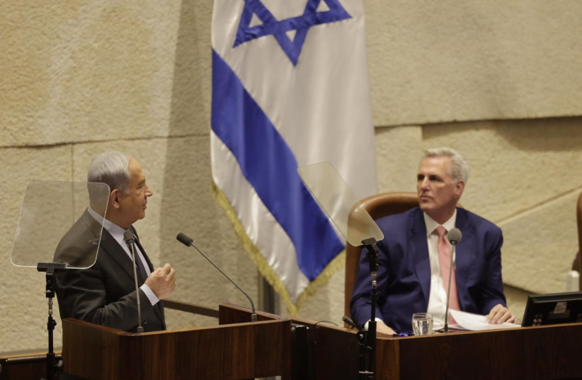  Israeli Prime Minister Benjamin Netanyahu (L) is seen next to US House of Representatives Speaker Kevin McCarthy in the Knesset in Jerusalem, on May 1, 2023. (photo credit: MARC ISRAEL SELLEM/THE JERUSALEM POST)