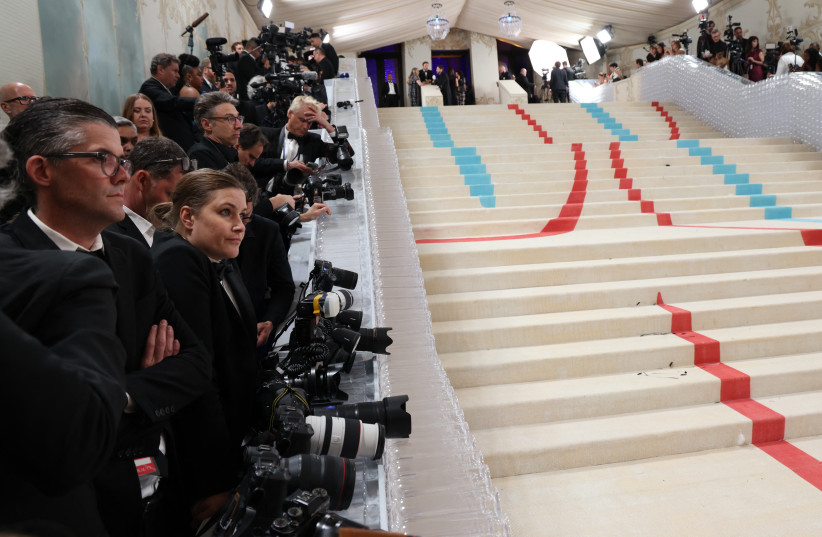  Photographers wait for Rihanna to arrive at the Met Gala, an annual fundraising gala held for the benefit of the Metropolitan Museum of Art's Costume Institute with this year's theme ''Karl Lagerfeld: A Line of Beauty'', in New York City, New York, US, May 1, 2023.  (credit: REUTERS/ANDREW KELLY)
