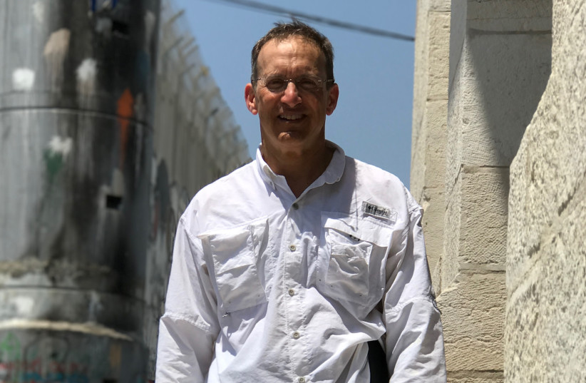 Dr. Steve Feldman, pictured on a trip to the West Bank. Feldman was denied payment from the state of Arkansas for refusing to sign a pledge promising not to boycott Israel.  (photo credit: Courtesy of Steve Feldman)