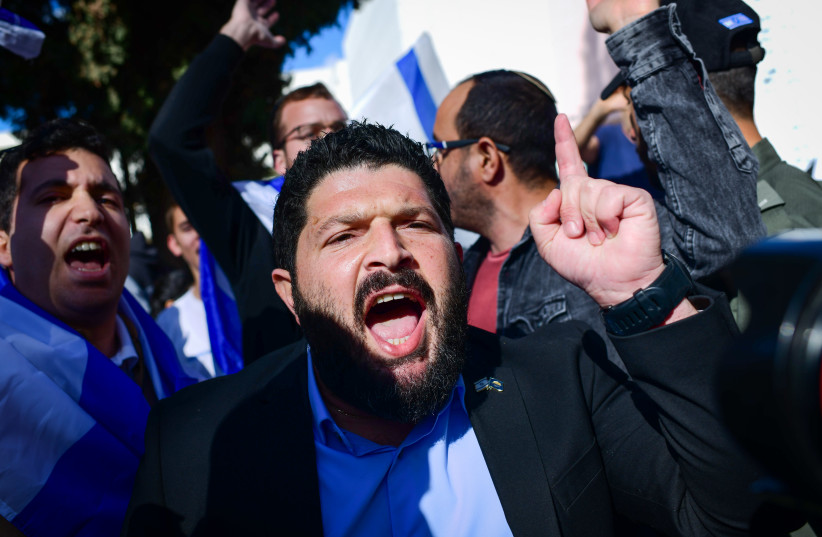   Otzma Yehudit MK Almog Cohen and right wing activists protest against a demonstration of Israeli-Arab students and activists against the Israeli army operation in Jenin, at the Tel Aviv University on January 30, 2023.  (photo credit: TOMER NEUBERG/FLASH90)