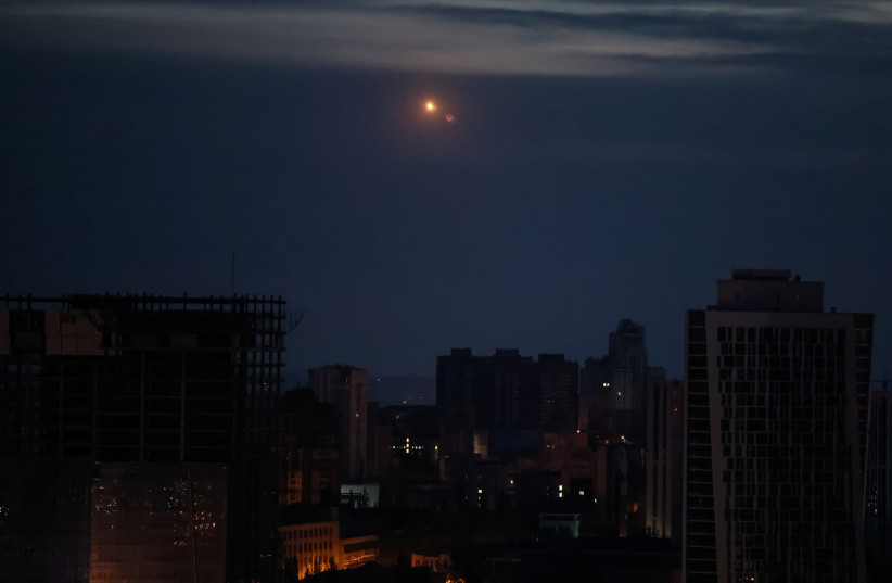  A trace of the explosion is seen in the sky over the city during a Russian drone strike, amid Russia's attack on Ukraine, in Kyiv, Ukraine May 4, 2023.  (photo credit: GLEB GARANICH/REUTERS)
