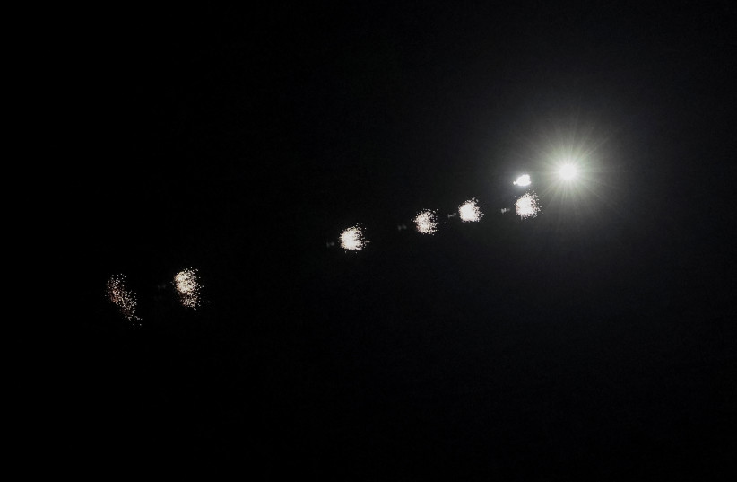 Traces of the explosions are seen in the sky over the city during a Russian drone strike, amid Russia's attack on Ukraine, in Kyiv, Ukraine May 3, 2023.
