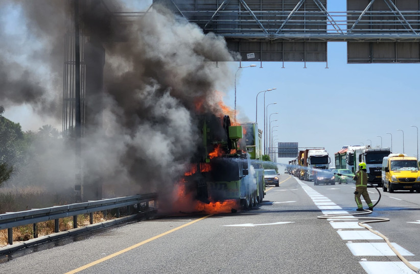 Israel Fire and Rescue Services responded to a call on Highway 4 near Yavne where a truck was on fire on May 4, 2023. (photo credit: ISRAEL FIRE AND RESCUE SERVICES CENTER DIVISION)