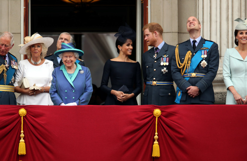  THE ROYAL family watch a fly-past from the Buckingham Palace balcony to mark the centenary of the Royal Air Force, 2018. (credit: Chris Radburn/Reuters)