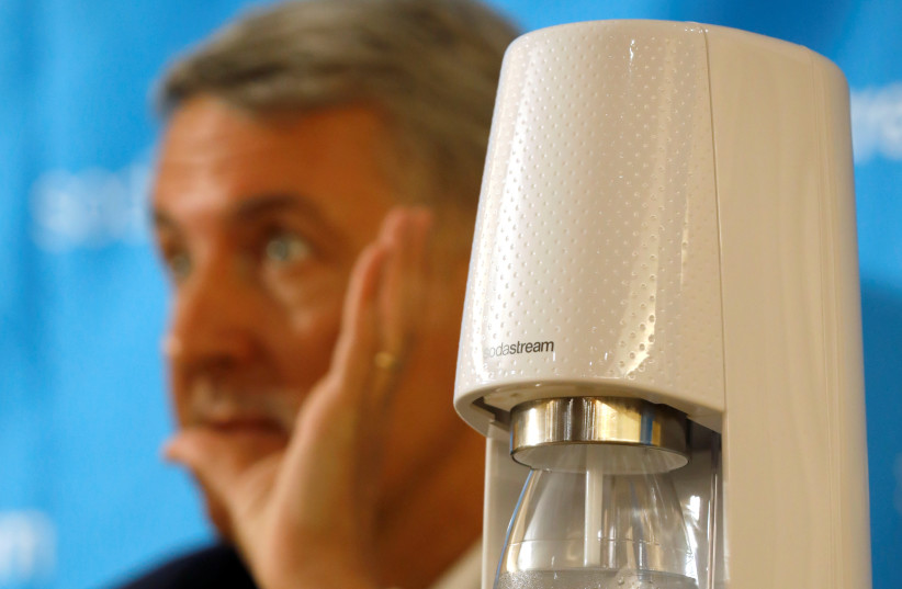  Ramon Laguarta, Elected Chief Executive Officer of PepsiCo, speaks next to a SodaStream device during a meeting with Daniel Birnbaum, CEO of SodaStream (not seen), in Tel Aviv, Israel, August 20, 2018 (credit: REUTERS/AMIR COHEN)