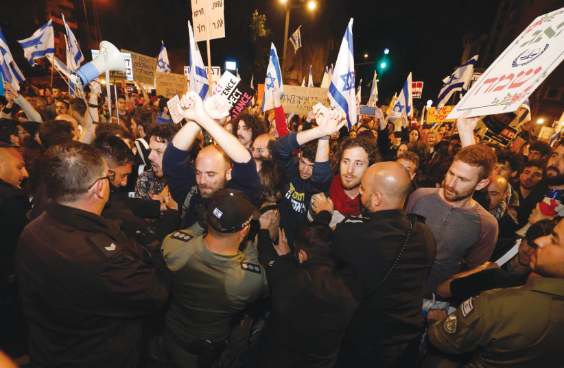  A PROTEST OUTSIDE Prime Minister Benjamin Netanyahu’s Jerusalem home. (credit: MARC ISRAEL SELLEM/THE JERUSALEM POST)
