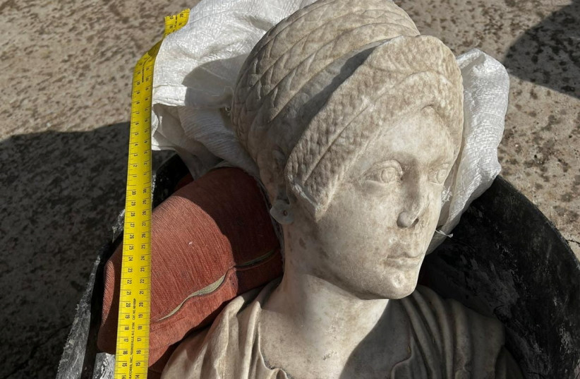 A view of a marble bust believed to represent Salonia Matidia, niece of Roman emperor Trajan, which was among the stolen artefacts that were recovered during a crackdown on international art trafficking, at an unknown location, in Spain, in this undated handout picture obtained by Reuters on May 4,  (credit: Courtesy of Europol/Handout via REUTERS )