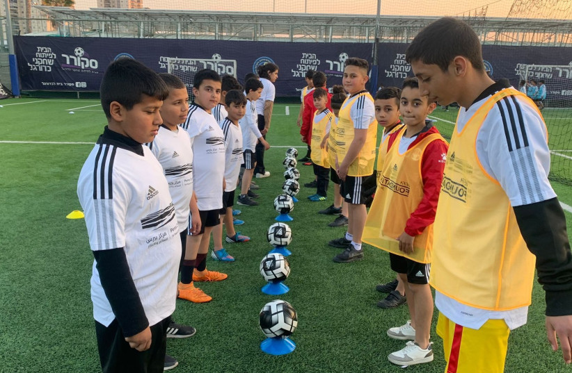  Children participating in the Peres Center's sports project in Beersheba.  (photo credit: PERES CENTER FOR PEACE AND INNOVATION)