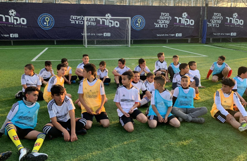  Children participating in the Peres Center's sports project in Be’er Sheva (credit: PERES CENTER FOR PEACE AND INNOVATION)