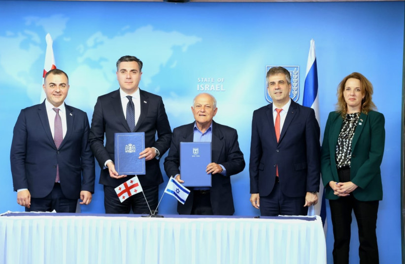  Israeli Foreign Minister Haim Katz and Georgian Foreign Minister Ilia Darchiashvili sign agreement to promote tourism between their respective countries. (credit: MIRI SHIMONOVITZ/FOREIGN AFFAIRS MINISTRY)