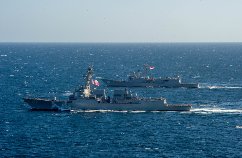 A US Navy guided-missile destroyer USS Jason Dunham (DDG 109) and Egyptian Navy frigate ENS Alexandria (F911) conduct manoeuvring-operation exercises during a 60 nations International Maritime Exercise/Cutlass Express 2022 (IMX/CE-2022), in Red Sea, in this photo taken on February 7, 2022 (photo credit: US NAVAL FORCES CENTRAL COMMAND/US NAVY THEOPLIS STEWART LL/HANDOUT VIA REUTERS)