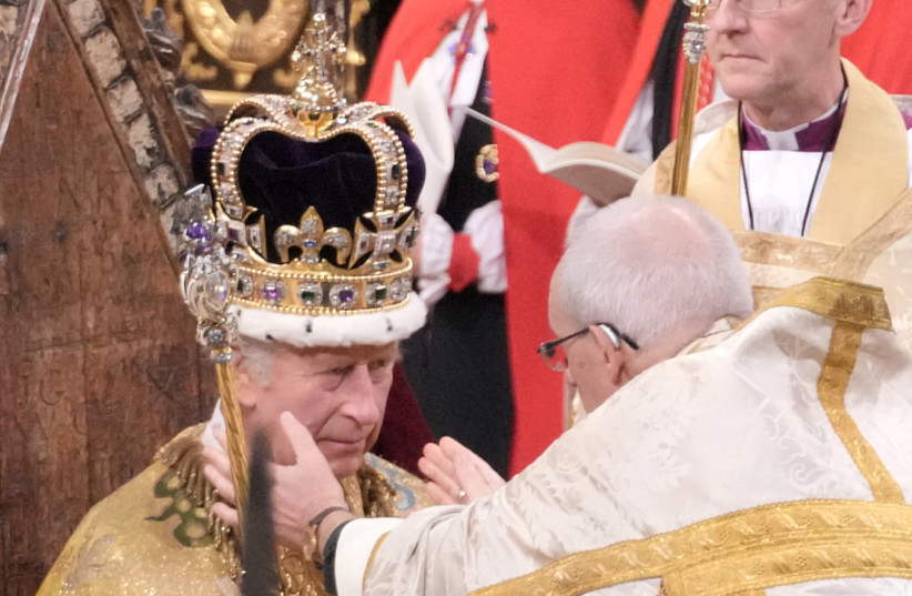  King Charles III receives The St Edward's Crown during his coronation ceremony in Westminster Abbey, London.  (photo credit: JONATHAN BRADY/POOL VIA REUTERS)
