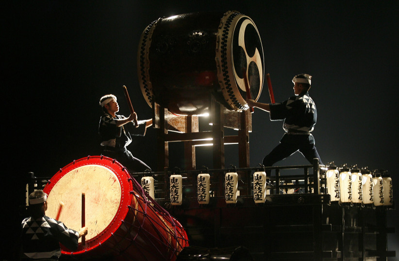  Members of the Japanese troupe ''Ondekoza'' (Demon drum group), which specializes in taiko drumming, performs during concert in Belgrade February 12, 2008. (credit: REUTERS/Ivan Milutinovic)