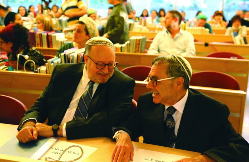 Rabbi Shlomo Riskin (right) with his successor, Rabbi Kenneth Brander, at a graduation ceremony at OTS’s Midreshet Lindenbaum (photo credit: GERSHON ELLINSON)