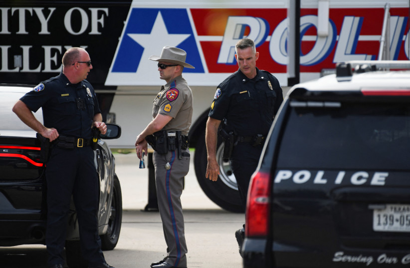  Officers with the Allen Police Department man the mobile command post the day after a gunman shot multiple people at the Dallas-area Allen Premium Outlets mall in Allen, Texas, US May 7, 2023. (photo credit: REUTERS/Jeremy Lock)
