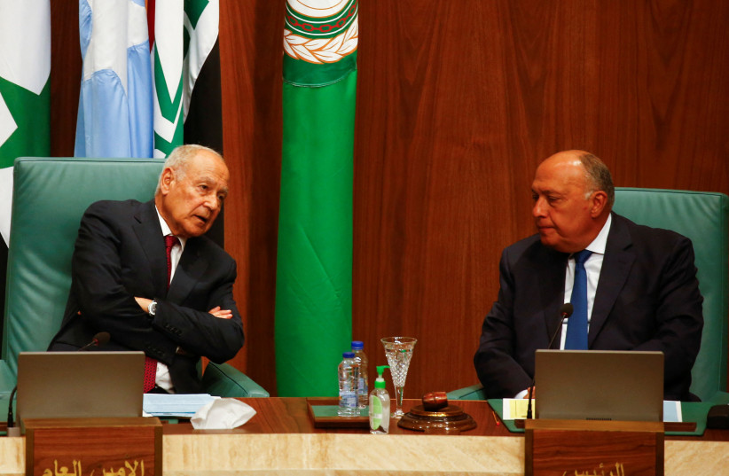  Secretary General of the Arab League Ahmed Aboul Gheit talks with Egypt's Foreign Minister Sameh Shoukry during the opening session of the meeting of Arab foreign ministers at the Arab League Headquarters, to discuss the Syrian situation and Sudan crisis, in Cairo, Egypt May 7, 2023. (photo credit: Amr Abdallah Dalsh/Reuters)