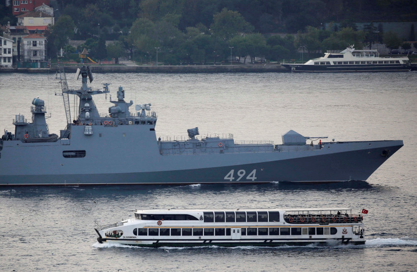  The Russian Navy's frigate Admiral Grigorovich sails in the Bosphorus on its way to the Mediterranean Sea, in Istanbul (photo credit: REUTERS)