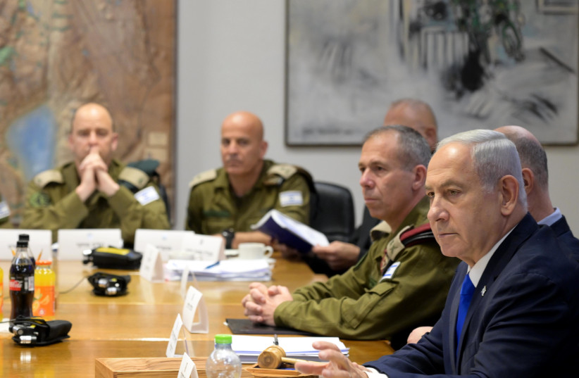 Prime Minister Benjamin Netanyahu is seen among Israeli security chiefs in a situational assessment during Operation Shield and Arrow, May 9, 2023 (photo credit: GPO/AVI OHAYON)
