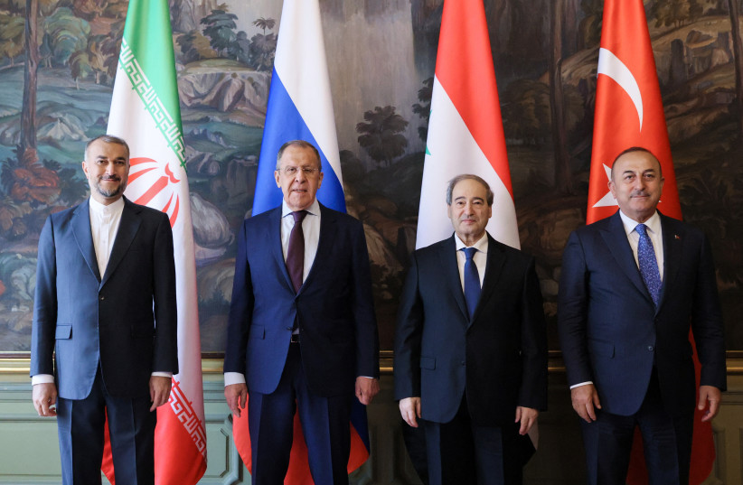  Foreign ministers Hossein Amirabdollahian of Iran, Sergei Lavrov of Russia, Faisal Mekdad of Syria and Mevlut Cavusoglu of Turkey pose for a picture during a meeting in Moscow, Russia, May 10, 2023. (photo credit: RUSSIAN FOREIGN MINISTRY/HANDOUT VIA REUTERS)