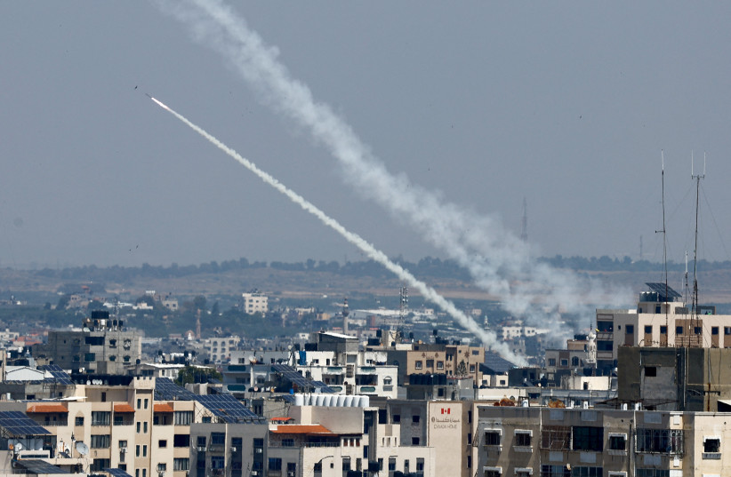  Rockets are fired from Gaza into Israel, in Gaza on May 10, 2023.  (credit: MOHAMMED SALEM/REUTERS)