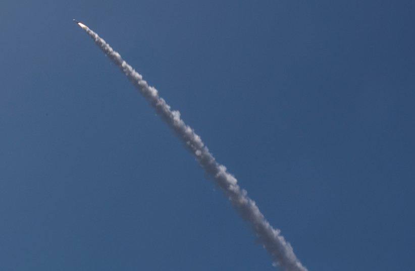  An Israeli Iron Dome anti-missile system intercepts a rocket launched from the Gaza Strip, in Ashdod, Israel May 10, 2023. (credit: AMMAR AWAD/REUTERS)