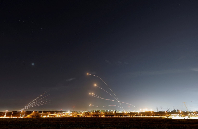  Israel's Iron Dome anti-missile system intercept rockets launched from the Gaza Strip, in Sderot, Israel May 10, 2023 (photo credit: AMMAR AWAD/REUTERS)