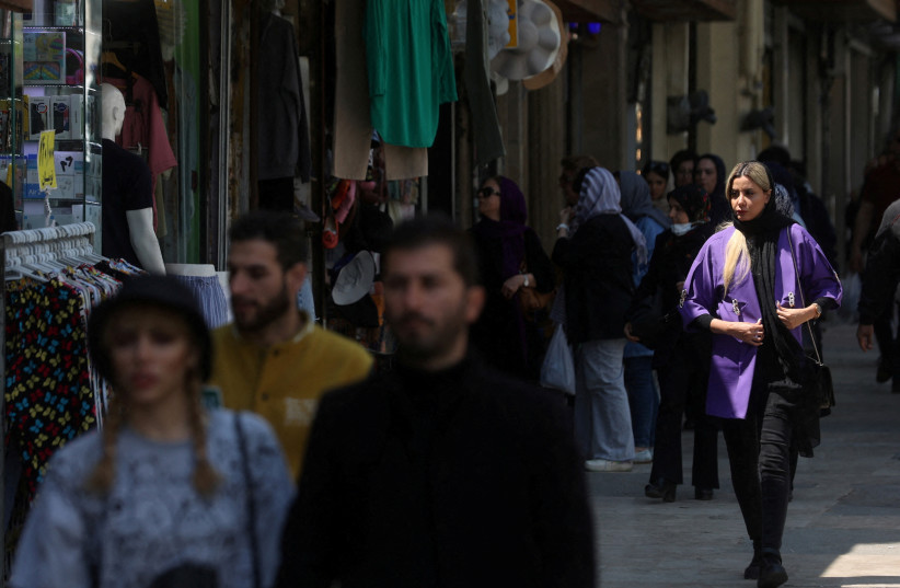 An Iranian woman walks on a street amid the implementation of the new hijab surveillance in Tehran, Iran, April 15, 2023 (credit: MAJID ASGARIPOUR/WANA (WEST ASIA NEWS AGENCY) VIA REUTERS)