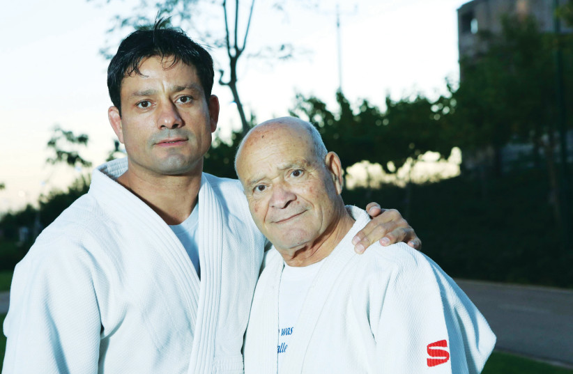  SMADJA WITH father-trainer, Morris, who helped introduce judo to Israel. (photo credit: ODED KARNI)