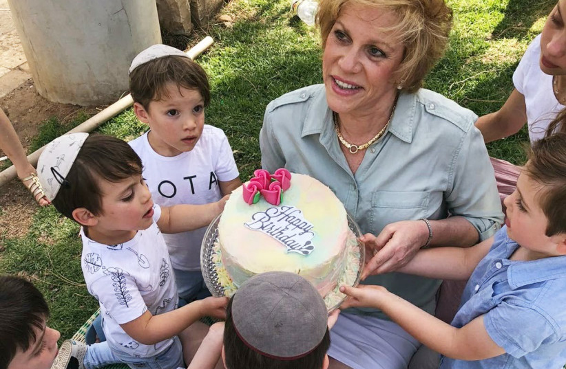  CELEBRATING HER birthday with grandchildren. (credit: COURTESY RISA SHAPIRO)
