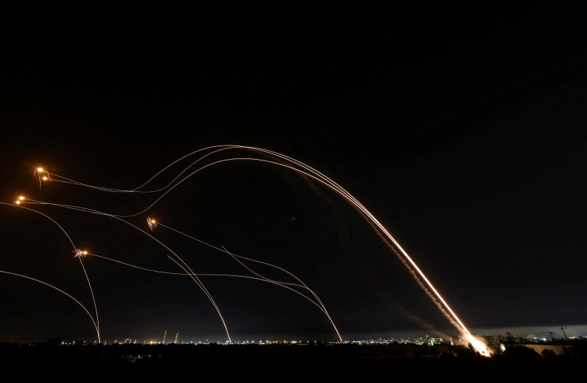  Israel's Iron Dome anti-missile system fire to intercept rockets launched from the Gaza Strip, as seen from the city of Ashkelon, Israel May 11, 2023. (credit: REUTERS/Ronen Zvulun)