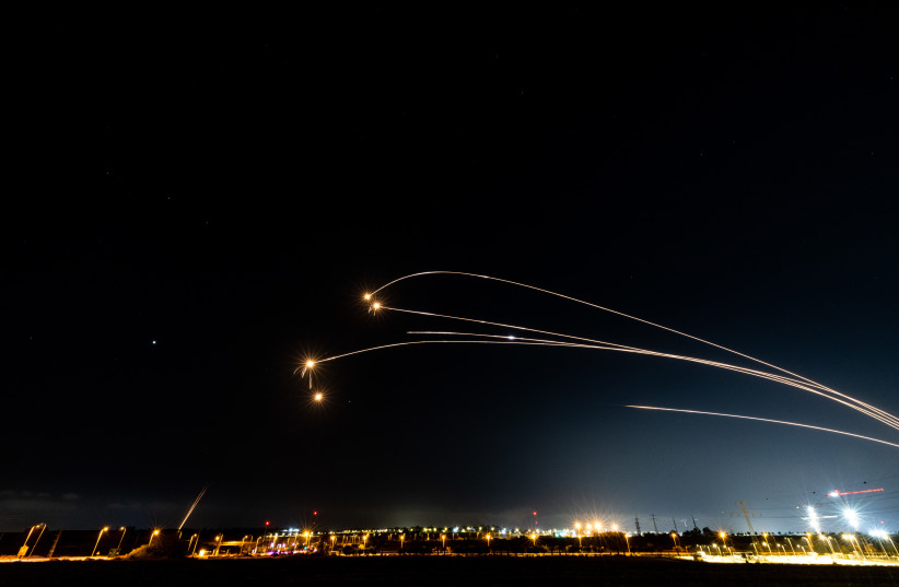  Iron dome anti-missile system fires interception missiles as rockets fired from the Gaza Strip to Israel, as it seen from Sderot, on May 13, 2023. (credit: YONATAN SINDEL/FLASH90)